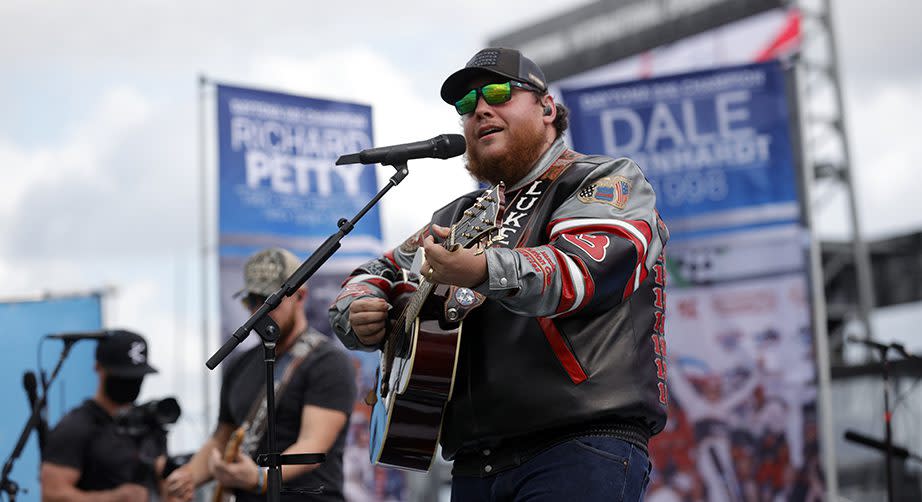 DAYTONA BEACH, FLORIDA - FEBRUARY 14: Singer Luke Combs performs prior to the NASCAR Cup Series 63rd Annual Daytona 500 at Daytona International Speedway on February 14, 2021 in Daytona Beach, Florida. (Photo by Chris Graythen/Getty Images) | Getty Images