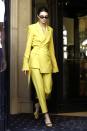 <p><strong>September 2018 </strong>Kendall Jenner embraced brights in a yellow suit from House of Holland, when out in Paris. </p>