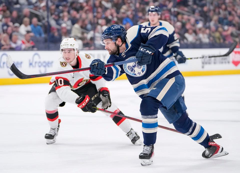 Columbus Blue Jackets center Emil Bemstrom (52) fires a shot past Ottawa Senators left wing Alex Formenton (10) during the first period of the NHL game at Nationwide Arena on April 22, 2022.