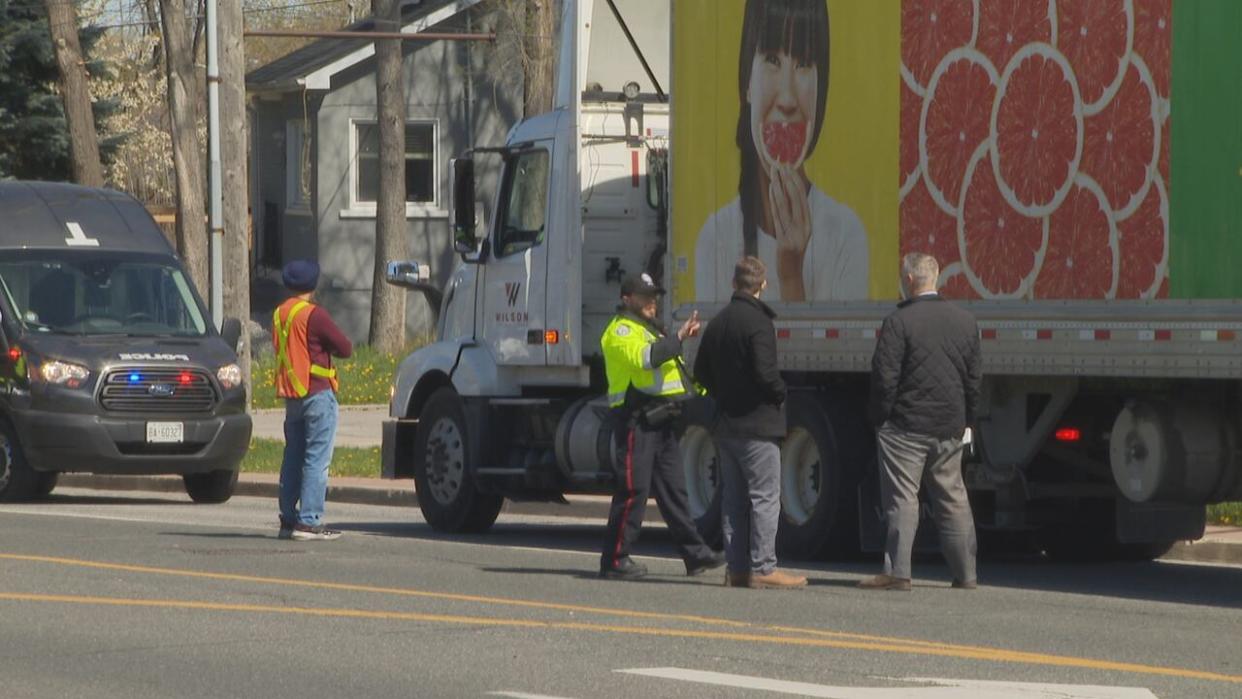 Toronto police are investigating after a boy was struck by a transport truck in Etobicoke Friday. (Igor Petrov/CBC - image credit)