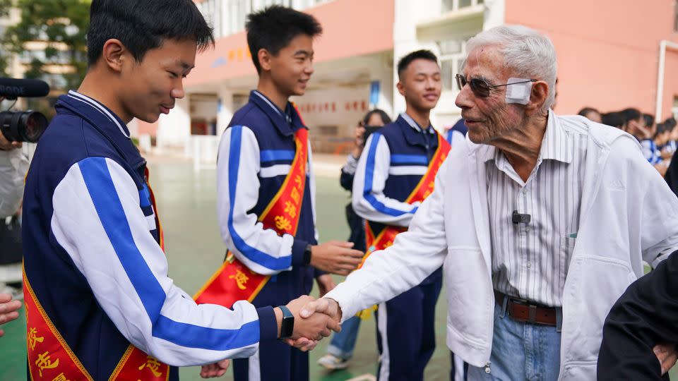 Harry Moyer, a 103-year-old US Flying Tigers veteran, visits the Kunming Foreign Language School in China's Yunnan province earlier this month. - Liu Ranyang/China News Service/VCG/Getty Images