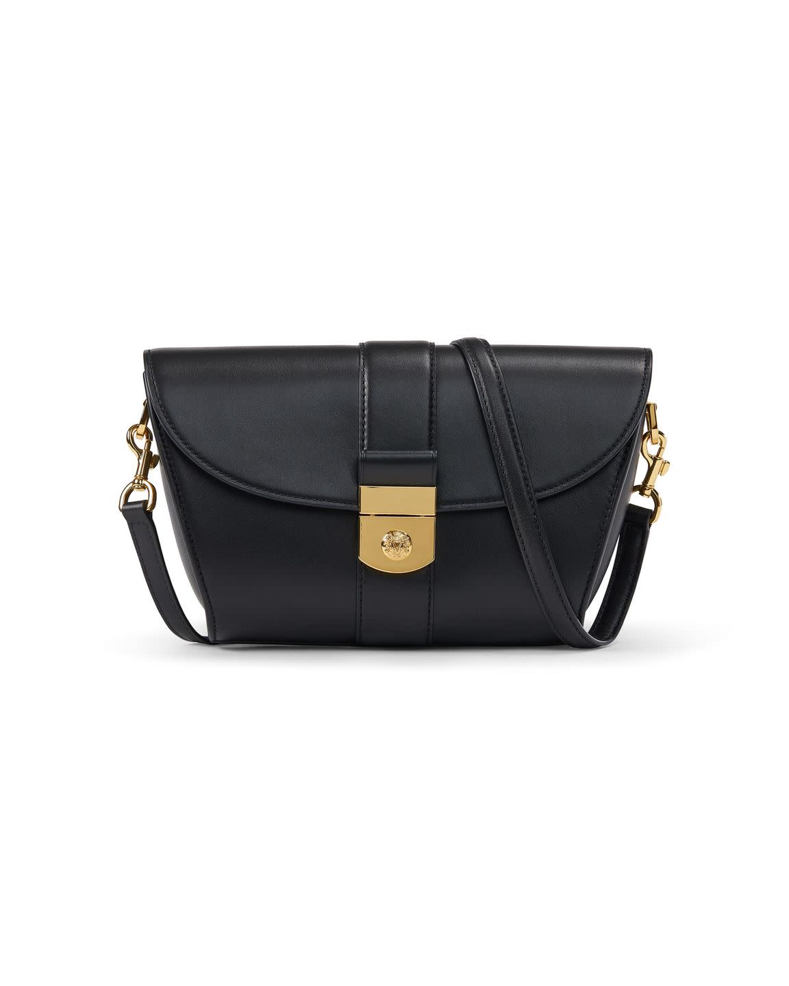 a black bag with a gold buckle