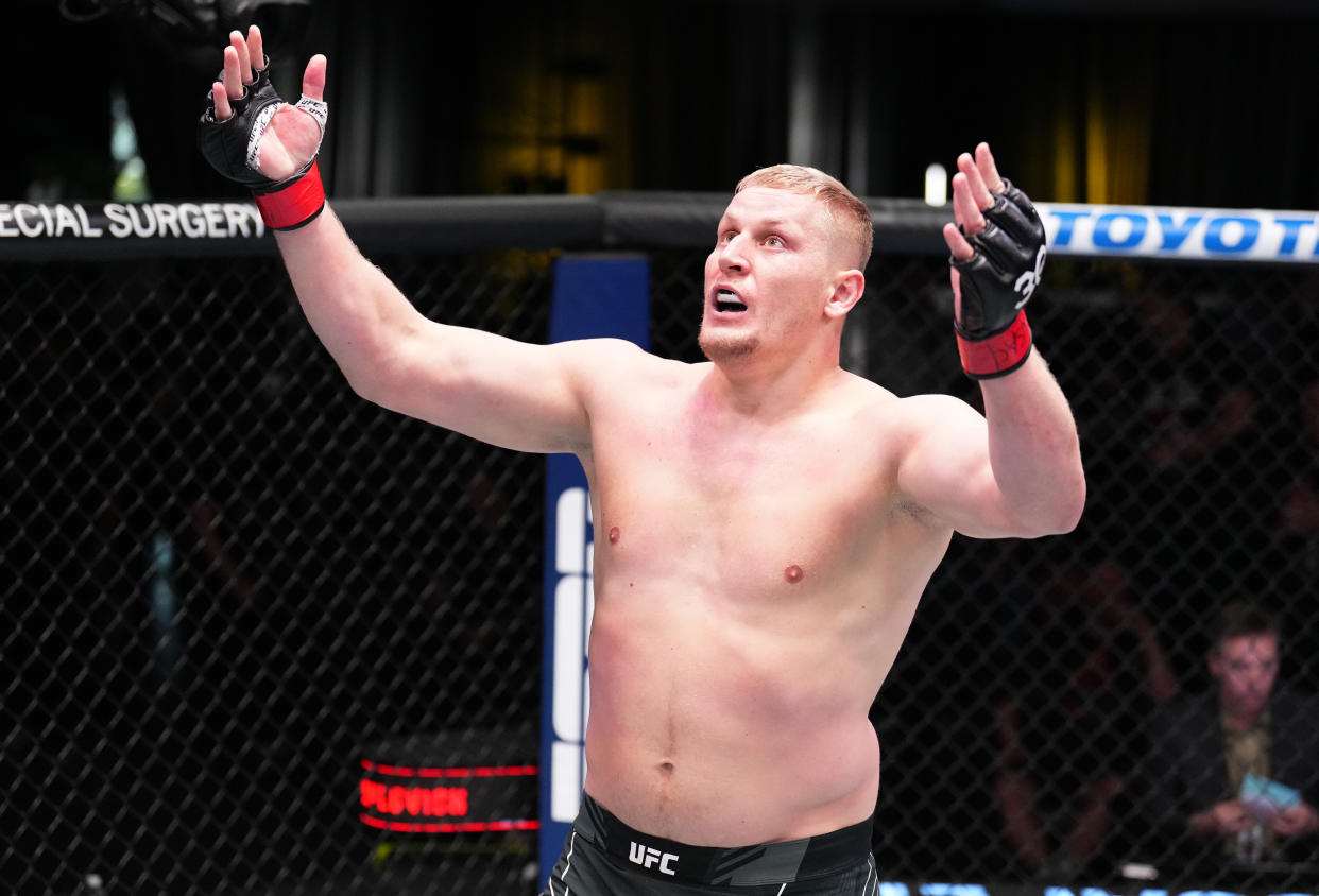 LAS VEGAS, NEVADA - APRIL 22: Sergei Pavlovich of Russia reacts after his TKO victory over Curtis Blaydes in a heavyweight fight during the UFC Fight Night event at UFC APEX on April 22, 2023 in Las Vegas, Nevada. (Photo by Chris Unger/Zuffa LLC via Getty Images)