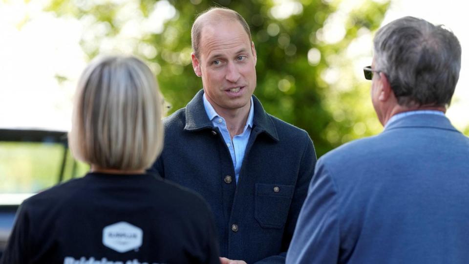 PHOTO: Prince William is greeted as he arrives for a visit to Surplus to Supper, a surplus food redistribution charity in Sunbury-on-Thames, Surrey, Britain, April 18, 2024. (Alastair Grant/Pool via Reuters)