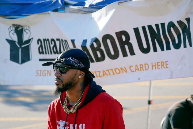 Amazon Labor Union President Chris Smalls collects signatures from workers outside the JFK8 warehouse in Staten Island, New York, last October. (Photo: via Associated Press)