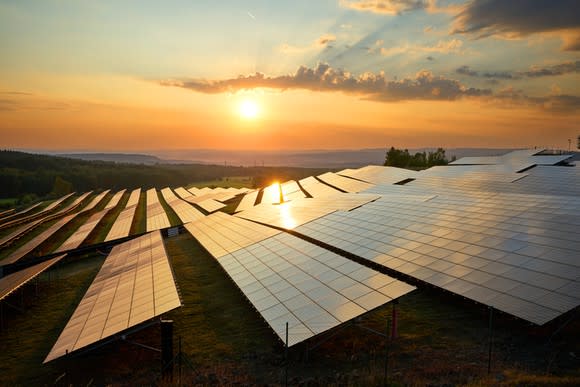 Solar panels and a sunset.