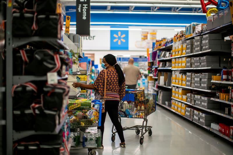 FILE PHOTO: A shopper is seen wearing a mask while shopping at a Walmart store, in North Brunswick, New Jersey