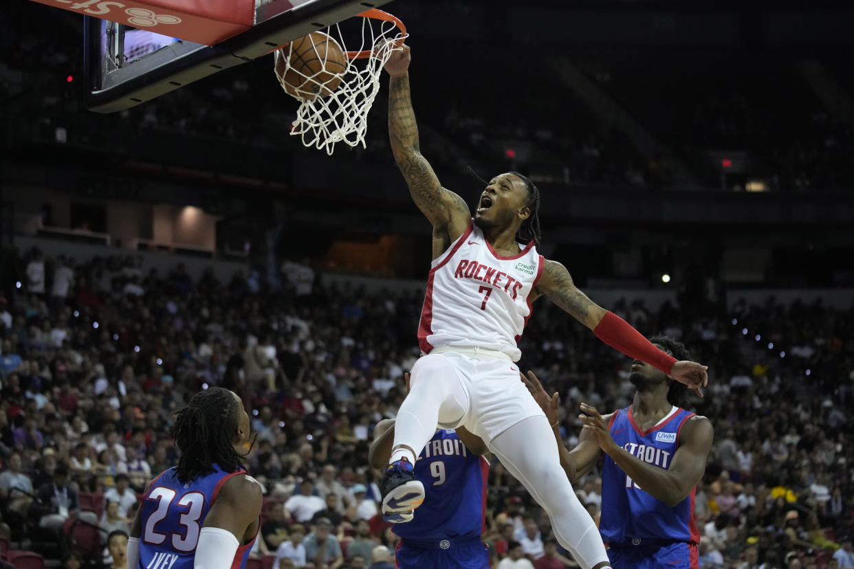 The Houston Rockets' Cam Whitmore dunks against the Detroit Pistons during NBA Summer League on July 9, 2023, in Las Vegas. (AP Photo/John Locher)