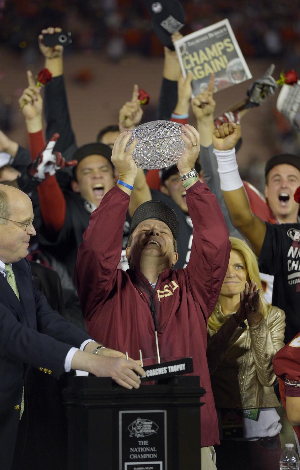 Florida State head coach Jimbo Fisher with The Coaches' Trophy after the NCAA BCS National Championship college football game against Auburn Monday, Jan. 6, 2014, in Pasadena, Calif. Florida State won 34-31. (AP Photo/Mark J. Terrill)