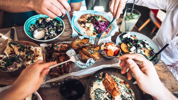 Happy people sharing their healthy lunch.