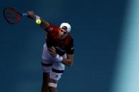 Mar 26, 2019; Miami Gardens, FL, USA; John Isner of the United States serves against Kyle Edmund of Great Britain (not pictured) in the fourth round of the Miami Open at Miami Open Tennis Complex. Mandatory Credit: Geoff Burke-USA TODAY Sports