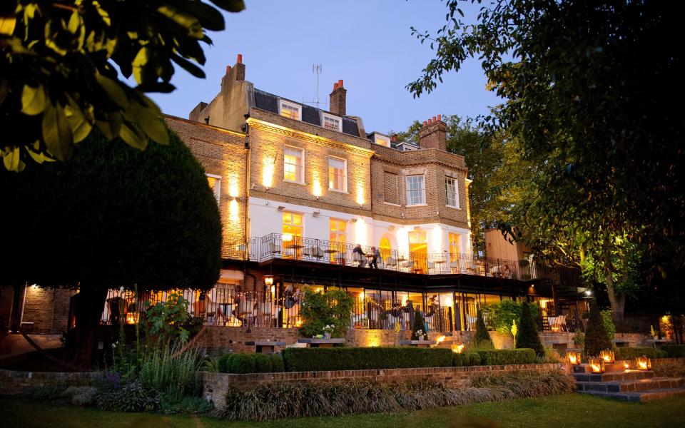 Bingham Riverhouse's most prized feature is the lawn leading to the Thames’s towpath and peaceful river beyond - Barney James / Timeless Pictures