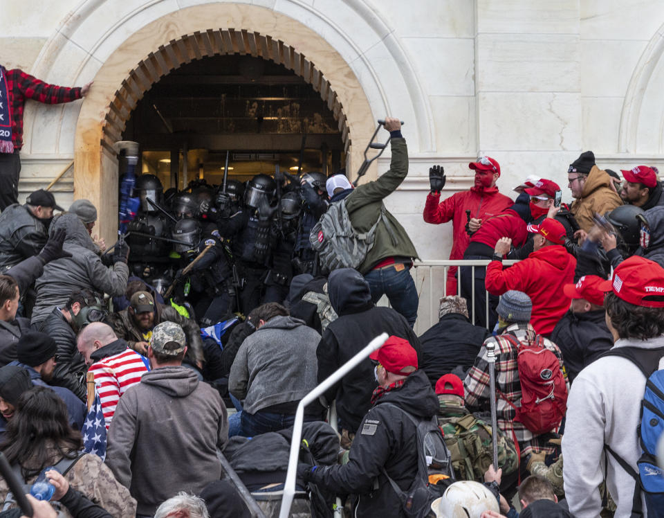 Rioters attacked police as they tried to enter the Capitol building through the front doors. One Capitol Police officer was killed. (Photo: Photo by Lev Radin/Pacific Press/LightRocket via Getty Images)