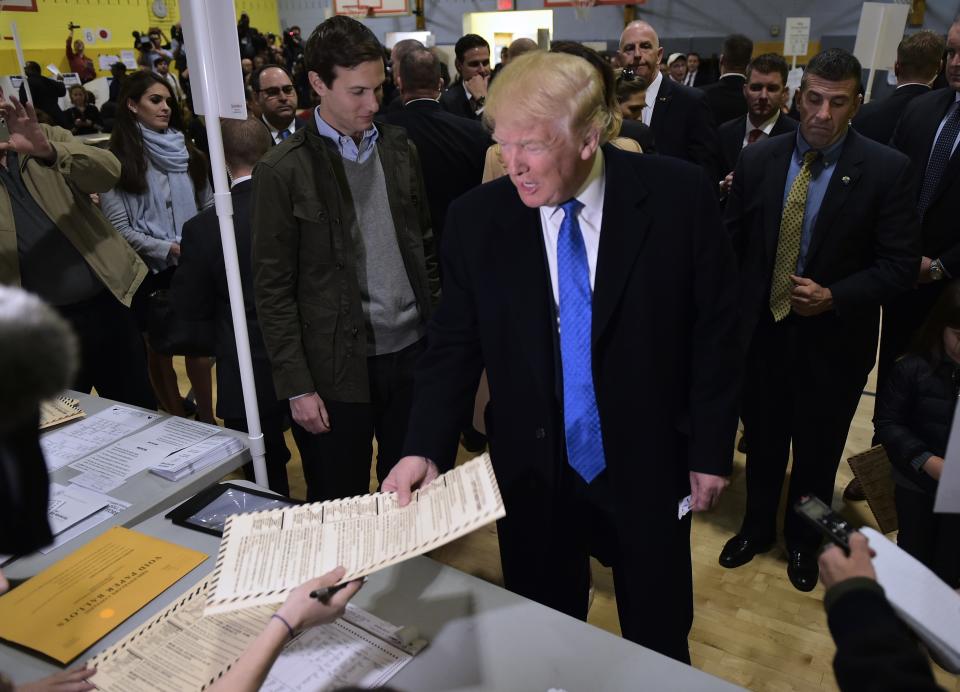 Republican presidential nominee Donald Trump casts his ballot at a polling station in a school during the 2016 presidential elections in New York, on Nov. 8.