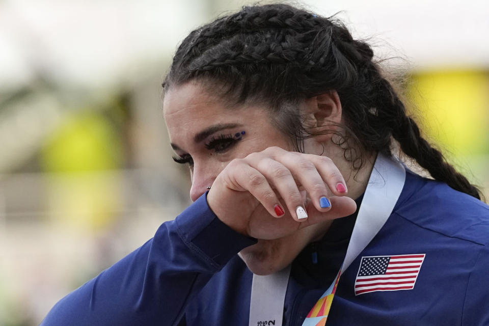 Gold medalist Chase Ealey, of the United States celebrates after a medal ceremony for the women's shot put final at the World Athletics Championships on Saturday, July 16, 2022, in Eugene, Ore. (AP Photo/David J. Phillip)