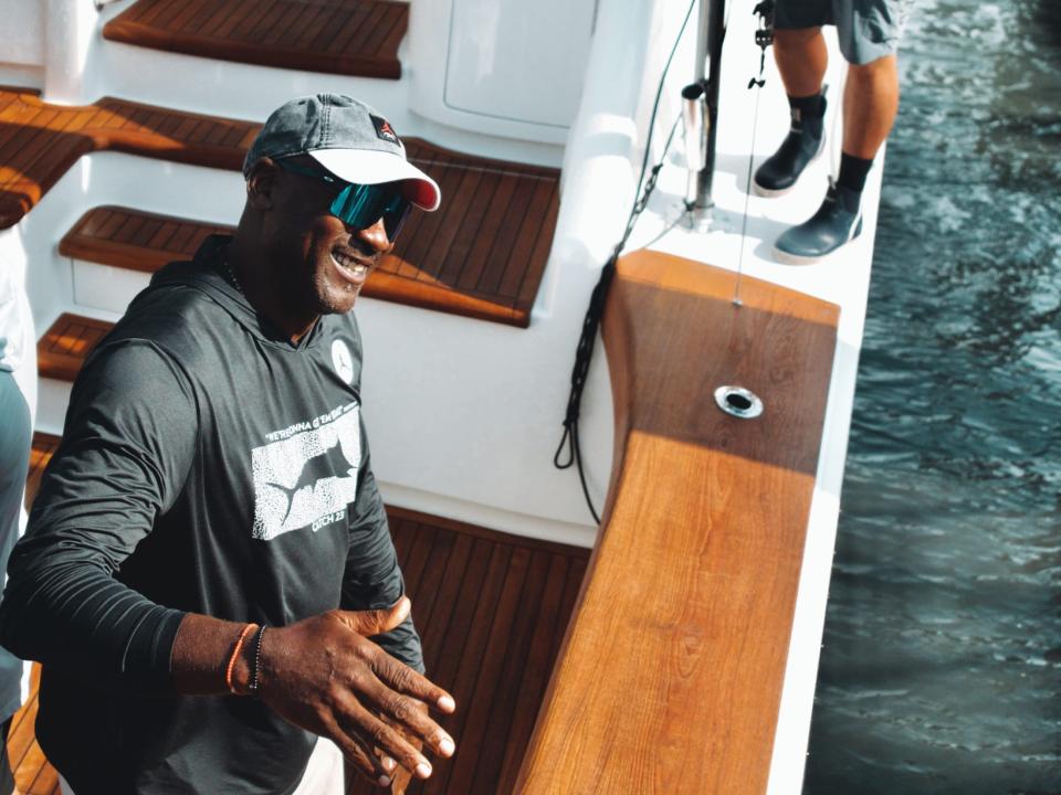 Michael Jordan on his boat "Catch 23."