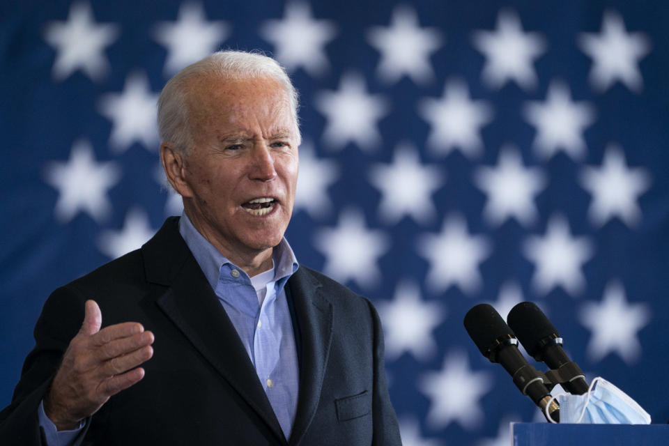 CLEVELAND, OH - NOVEMBER 02: Democratic presidential nominee Joe Biden speaks at a get-out-the-vote drive-in rally at Cleveland Burke Lakefront Airport on November 02, 2020 in Cleveland, Ohio. One day before the election, Biden is campaigning in Ohio and Pennsylvania,  key battleground states that President Donald Trump won narrowly in 2016. (Photo by Drew Angerer/Getty Images)