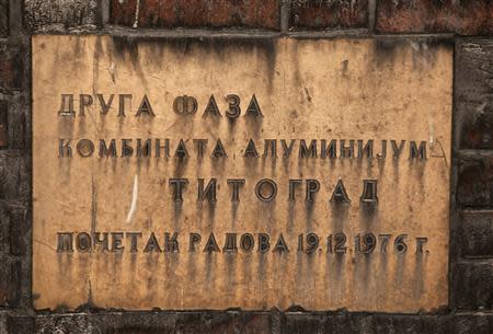 A plaque written in Cyrillic, which reads "Second phase, Aluminium factory, Titograd (previous name for city Podgorica), works started 19.12.1976", is seen at Montenegro's Kombinat Aluminijuma Podgorica (KAP) aluminium factory in Podgorica September 9, 2013. REUTERS/Stevo Vasiljevic