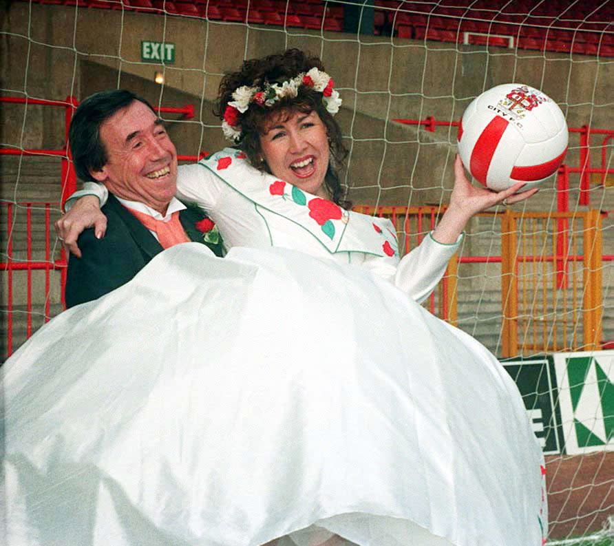 <p>Former England goalie Gordon Banks with his daughter Wendy in the goalmouth at Stoke City Football club after her marriage at the ground today to Shaun Beech. </p>