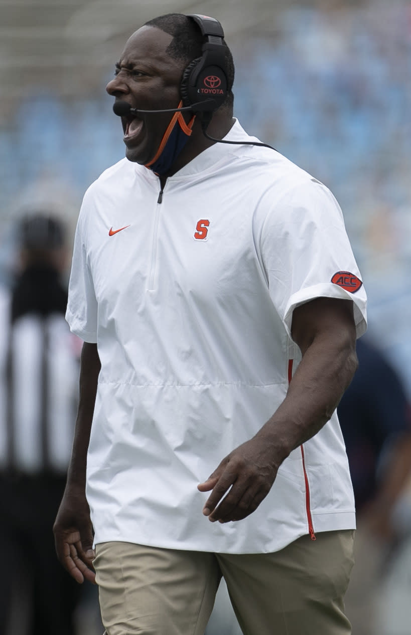 Syracuse head coach Dino Babers argues a call with the officials in the second quarter of an NCAA college football game against North Carolina on Saturday, Sept. 12, 2020 in Chapel Hill, N.C. (Robert Willett/The News & Observer via AP, Pool)