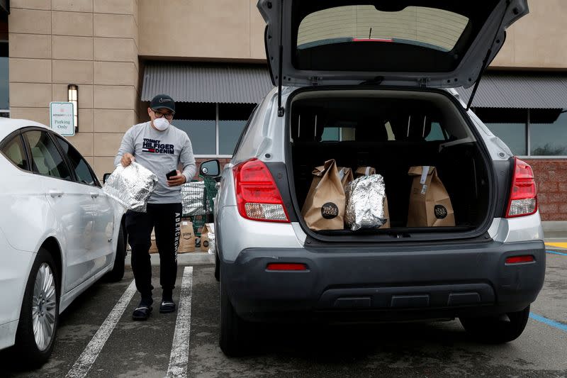 FILE PHOTO: A day in life of an Amazon courier during the coronavirus disease (COVID-19) outbreak