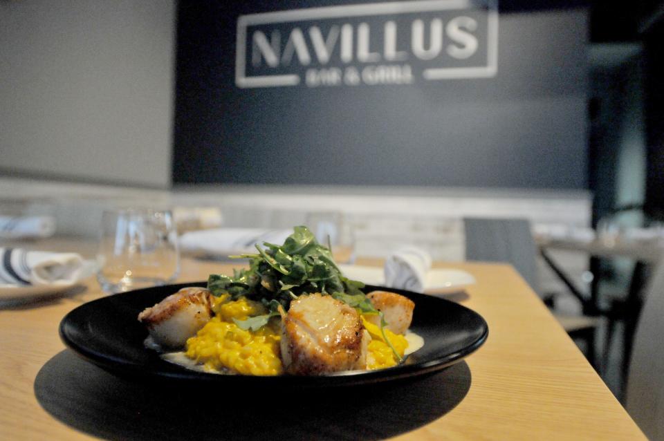 Pan-roasted scallops with roasted carrot risotto and grilled fennel is one of the menu items available at Navillus Bar & Grill. Navillus Bar & Grill has opened in the space Guapo's used to occupy in the Orleans Marketplace.