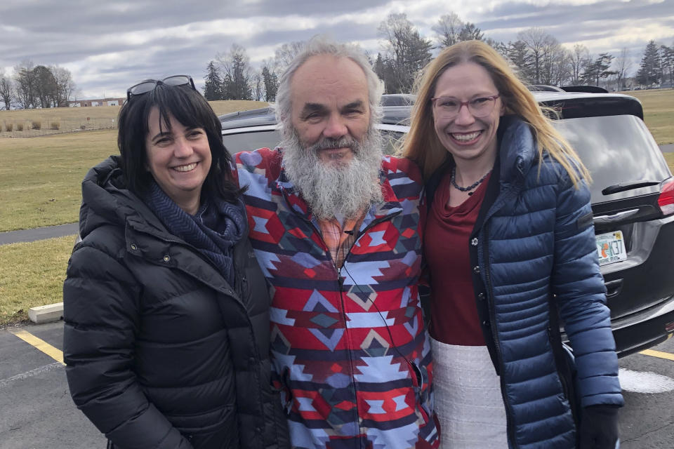 This photo provided by David Moran shows Jeff Titus, center, who was released from a prison in Coldwater, Mich., Friday, Feb. 24, 2023, after nearly 21 years. Reporting by Jacinda Davis, left, of the TV network Investigation Discovery, and Susan Simpson, right, of the podcast “Undisclosed,” played an important role in the discovery of new evidence suggesting an Ohio man might have killed two hunters in 1990. (David Moran via AP)