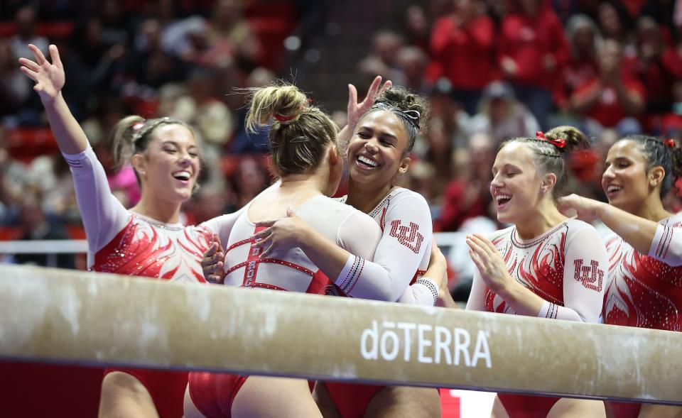 Utah Red Rocks gymnast Abby Paulson celebrates her beam performance with teammates in their match against ASU in Salt Lake City on Friday, Jan. 26, 2024. | Jeffrey D. Allred, Deseret News