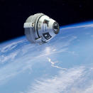 FILE - This artist's rendering provided by Boeing on Thursday, Aug. 18, 2016 shows the company's Starliner spacecraft. NASA astronaut Nicole Mann, who will test drive Boeing’s space capsule in 2021, envisions scientists, doctors, poets, reporters lining up for rocket rides. “I see this as a real possibility,” she said. “You’re going to see low-Earth orbit open up.” (Boeing via AP)