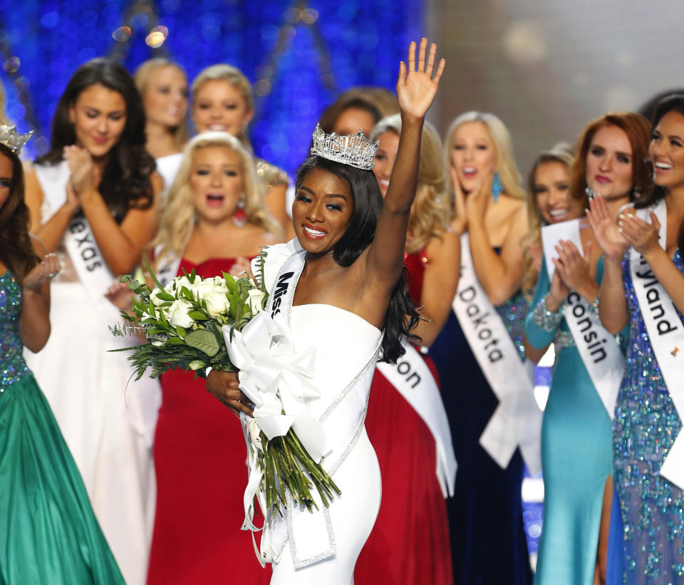 FILE - In this Sept. 9, 2018 file photo, Miss New York Nia Franklin reacts after being named Miss America 2019 in Atlantic City, N.J. The Miss America Organization says this year's pageant will be held at the Mohegan Sun Connecticut in Uncasville, Conn. It will be broadcast on NBC Dec. 19, in a switch from recent broadcaster ABC. (AP Photo/Noah K. Murray, File)