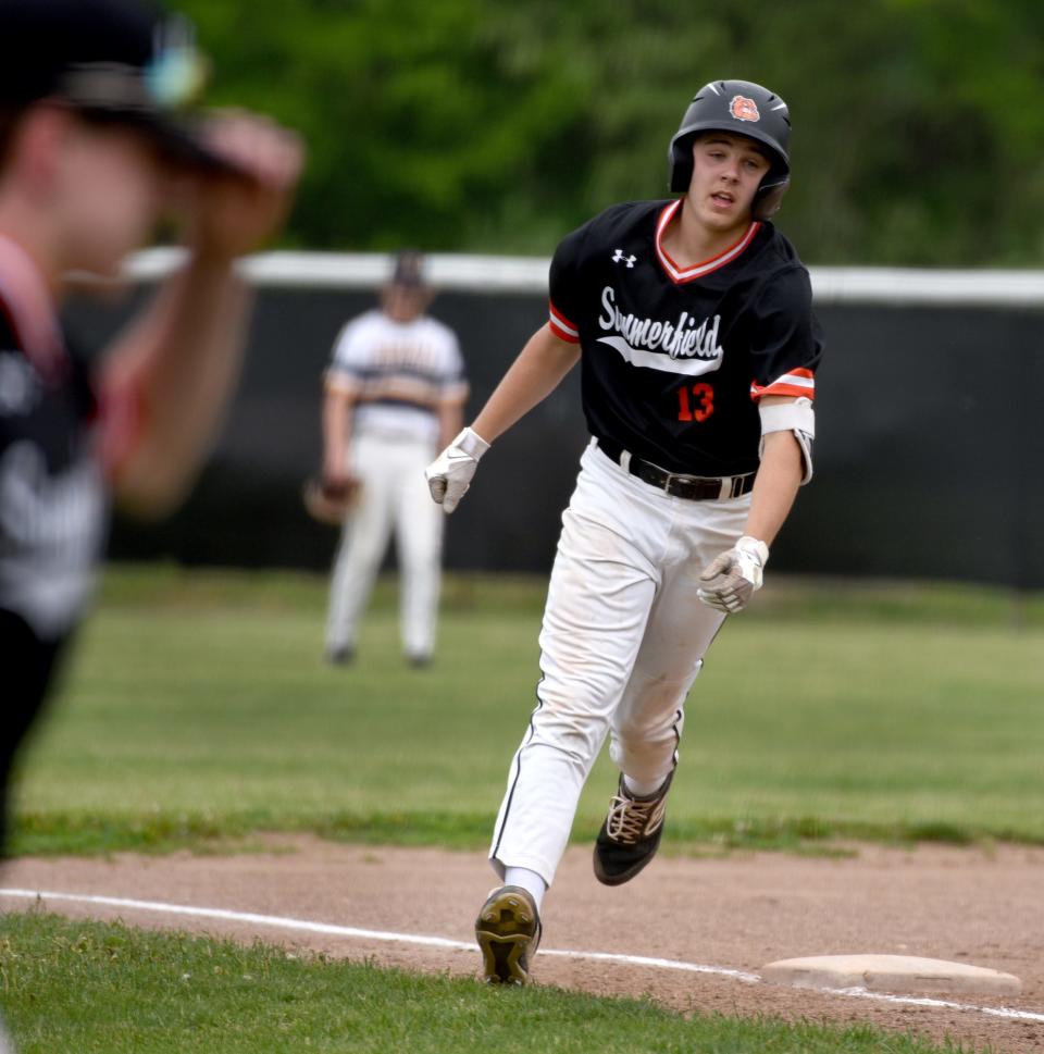 Logan Keane of Summerfield rounds third base after hitting a two-run home run against Whiteford Friday.