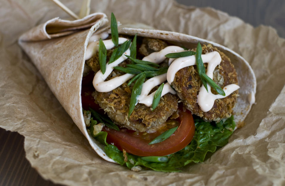 In this image taken on Nov. 26, 2012, a black eyed pea falafel with spicy aioli sauce is shown in Concord, N.H. (AP Photo/Matthew Mead)