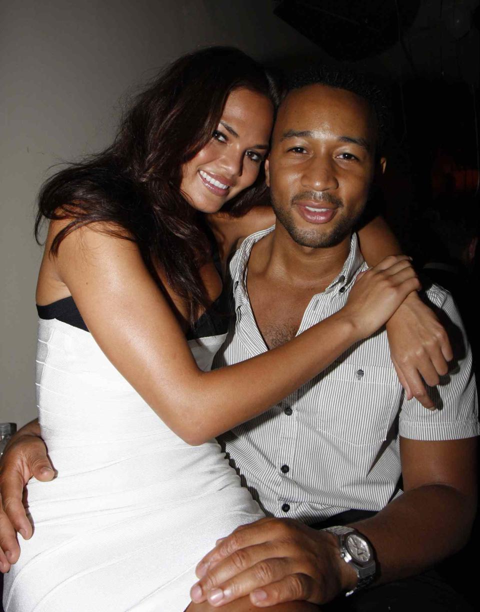 Chrissy Teigen (L) and John Legend attend the Best of Both Worlds birthday celebration at the Safe Harbor Penthouse on August 23, 2008 in New York City
