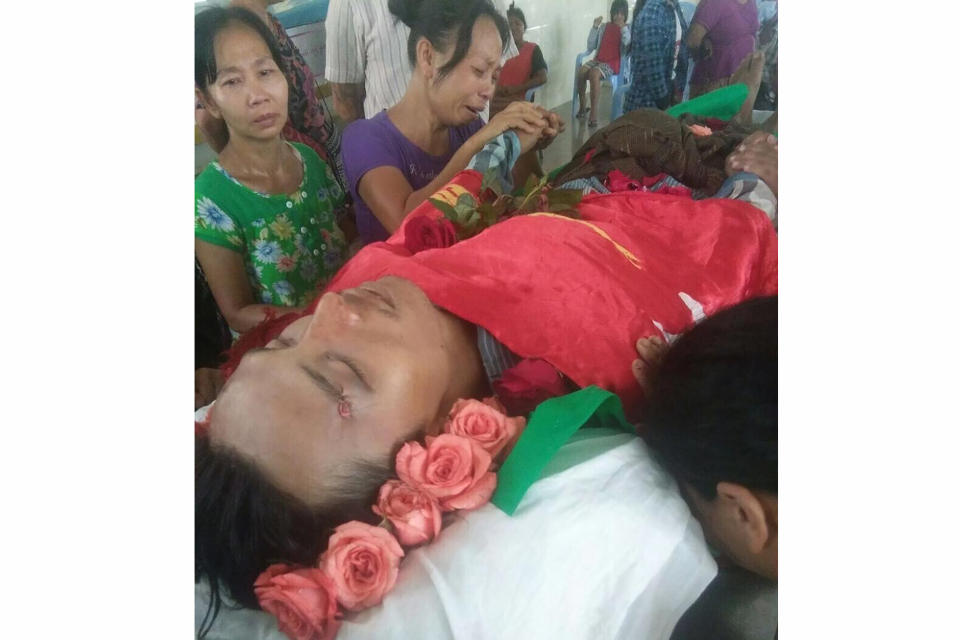 A woman cries during a funeral for a man who died after being shot during a protest in Yangon, Myanmar in March 2021. Since Myanmar's military dismissed the results of democratic elections and seized power on Feb. 1, 2021, peaceful nationwide protests and violent crackdowns by security forces have spiraled into a nationwide humanitarian crisis. (AP Photo)
