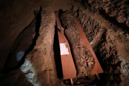 A number of mummies are seen inside the newly discovered burial site near Egypt's Saqqara necropolis, in Giza Egypt July 14, 2018. REUTERS/Mohamed Abd El Ghany