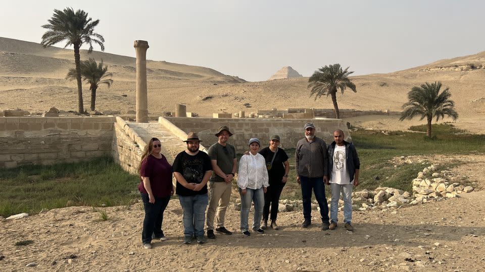The research team stands in front of the Unas’s Valley Temple, which would have acted as a river harbor in ancient Egypt. - Eman Ghoneim