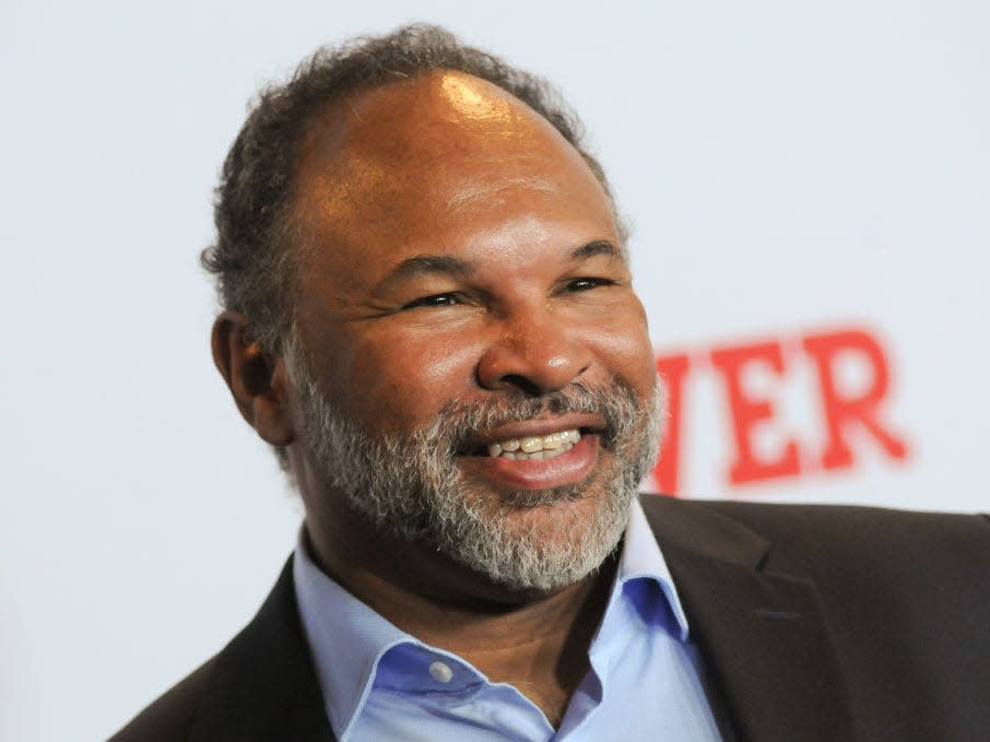 Geoffrey Owens smiles at a red carpet event