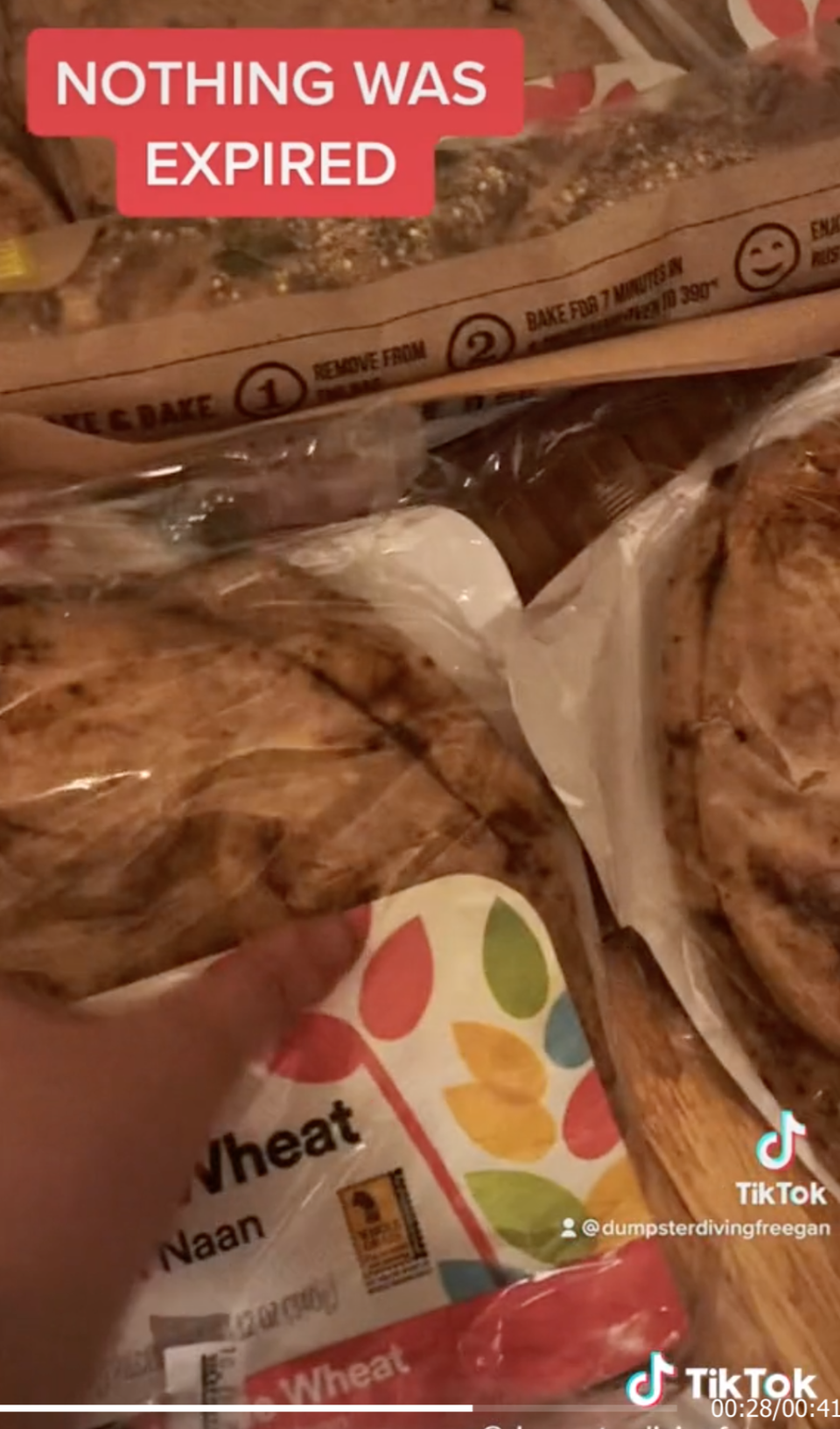 A TikTokker found dozens of Whole Foods food packages that had not expired in a dumpster (Tiktok.com/dumpsterdivingfreegan)
