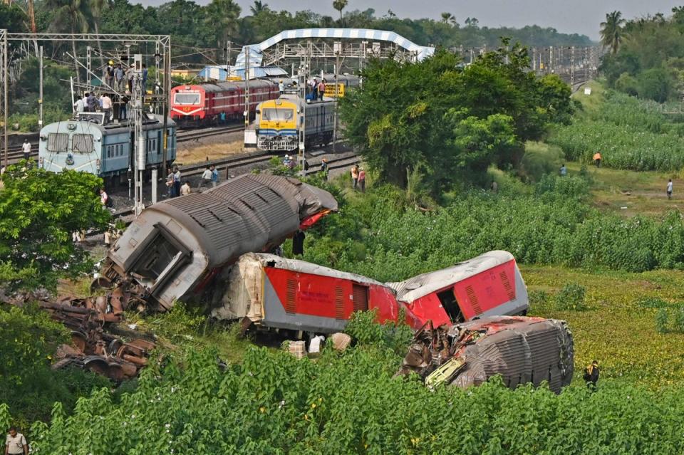 This view shows wrecked carriages at the accident site of a three-train collision near Balasor (AFP via Getty Images)