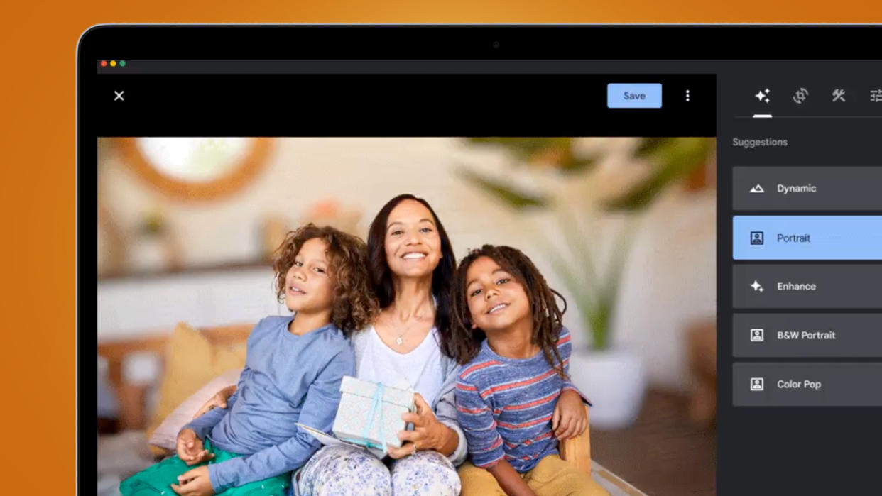  A laptop on an orange background showing a photo of a family photo being edited in Google Photos on web 