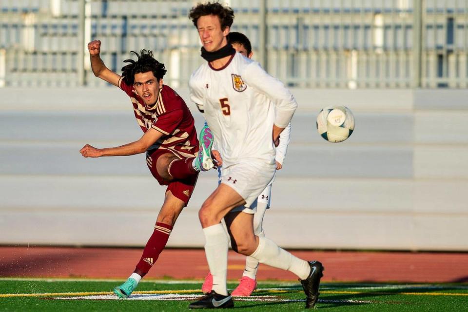 Golden Valley senior Roberto Ramires (14) takes a shot toward the net during a NorCal Regional playoff game against Las Lomas at Golden Valley High School in Merced, Calif., on Tuesday, Feb. 27, 2024. The Knights beat the Cougars 3-1 in penalty kicks.