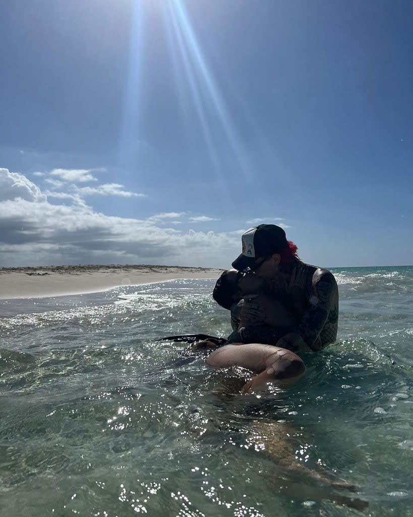 <p>Kissing in the Ocean</p>