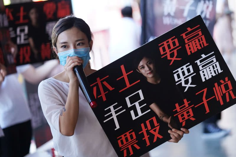 Wong Ji-yuet campaigns for the primary election aimed at selecting democracy candidates for the September election, in Hong Kong