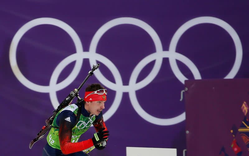 FILE PHOTO: Russia's Ustyugov skis during men's biathlon 4 x 7.5 km relay at Sochi 2014 Winter Olympic Games