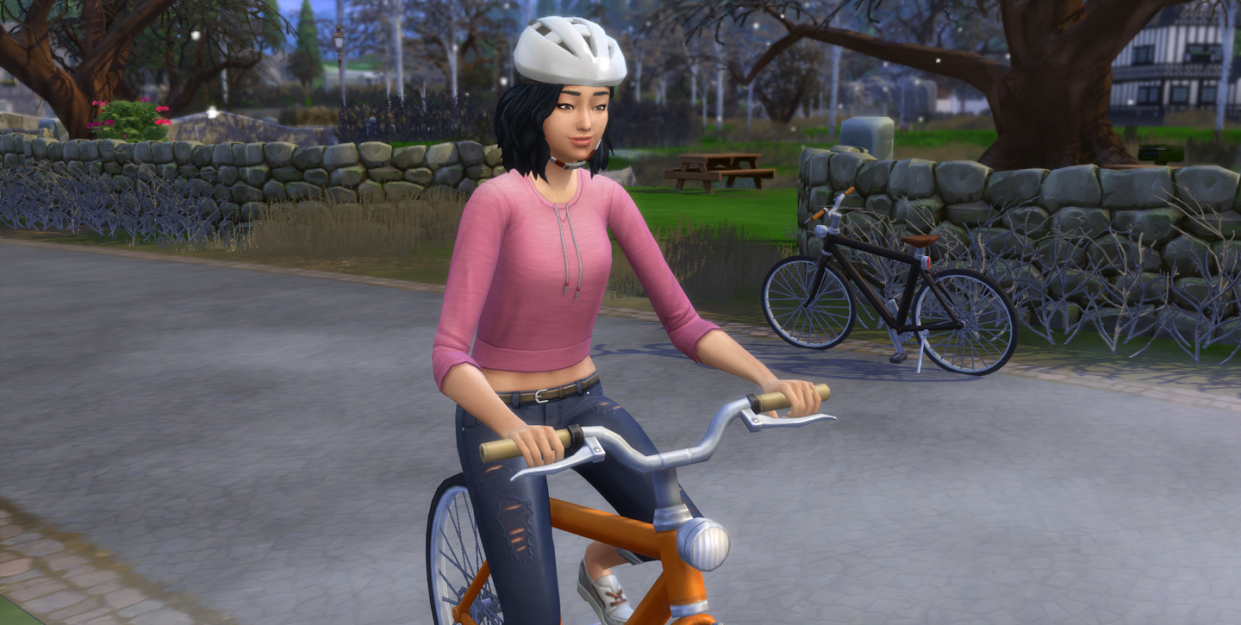 the sims 4 woman riding a bike