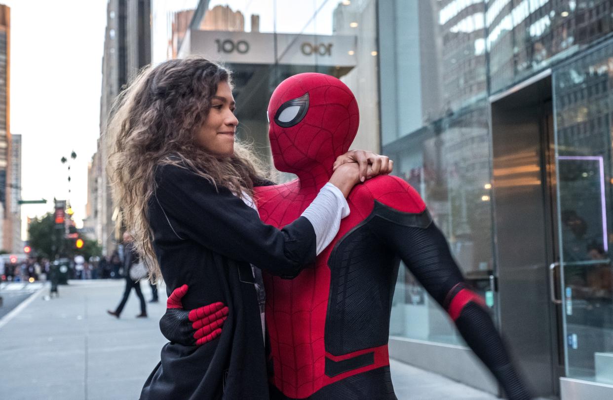 MJ (Zendaya) catches a ride from Spider-Man (Tom Holland) in "Spider-Man: Far From Home."