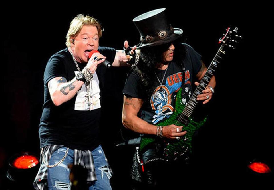 Axl Rose, left, with Slash during Guns N’ Roses's concert at Spectrum Center in Charlotte in September 2019.