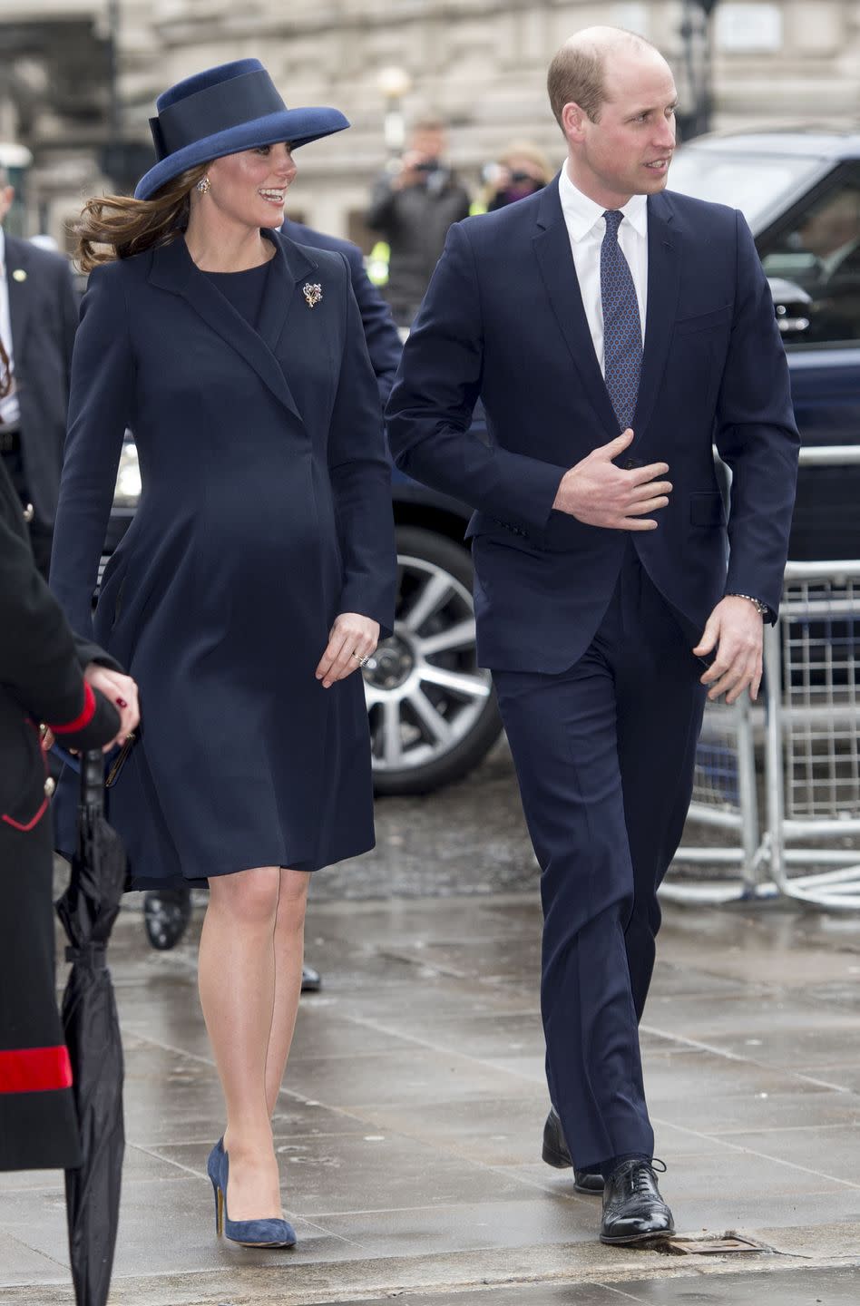 <p>For the Commonwealth Day service, Duchess Kate chose a dark blue Beulah London dress and coat set paired with a Lock and Co hat. She and her soon-to-be sister-in-law Meghan Markle were both sporting <a href="https://www.townandcountrymag.com/society/tradition/a19407133/meghan-markle-outfit-commonwealth-day/" rel="nofollow noopener" target="_blank" data-ylk="slk:navy pointy-toe pumps;elm:context_link;itc:0;sec:content-canvas" class="link ">navy pointy-toe pumps</a> for the occasion. </p>