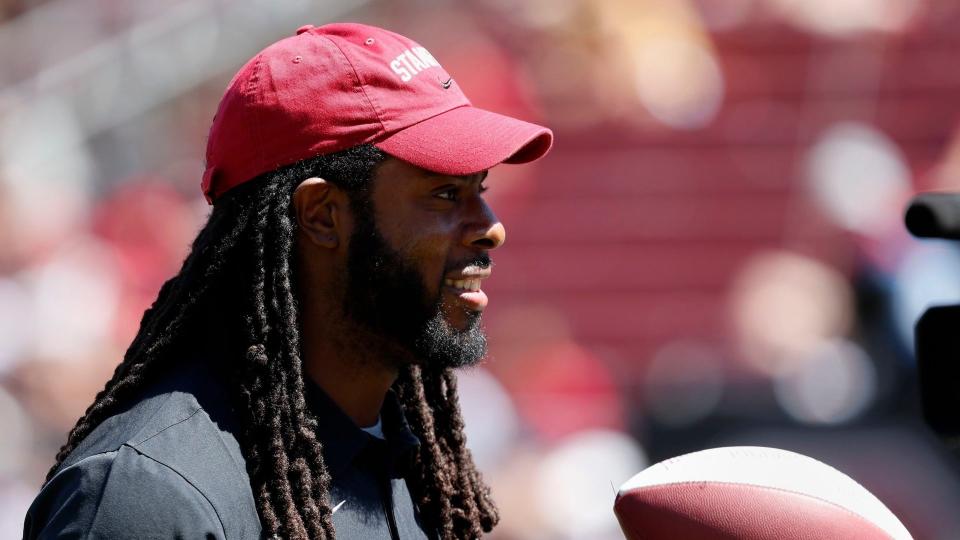 Mandatory Credit: Photo by Josie Lepe/AP/Shutterstock (10376405j)San Francisco 49ers' Richard Sherman (25) is honored with a Stanford football during the Stanford game against Northwestern at the end of the first quarter of an NCAA college football game in Stanford, CalifNorthwestern Football, Stanford, USA - 31 Aug 2019.