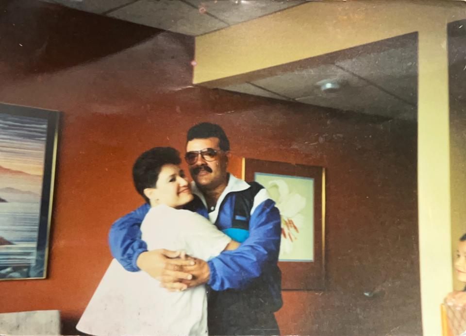 In this photo from 1986, a young Amelia "Cookie" and Jaime Rivera hold each other at an event in Rochester, New York.